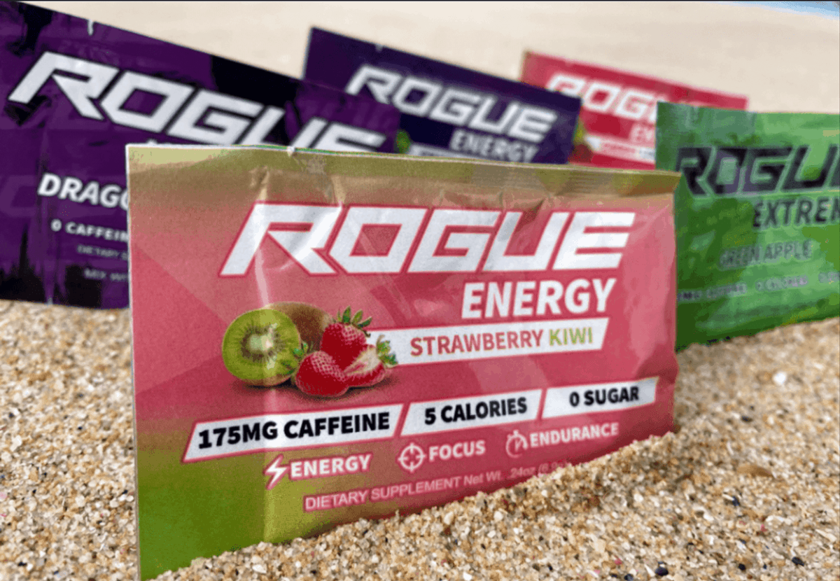 Few sachets of Rogue Energy in the sand.