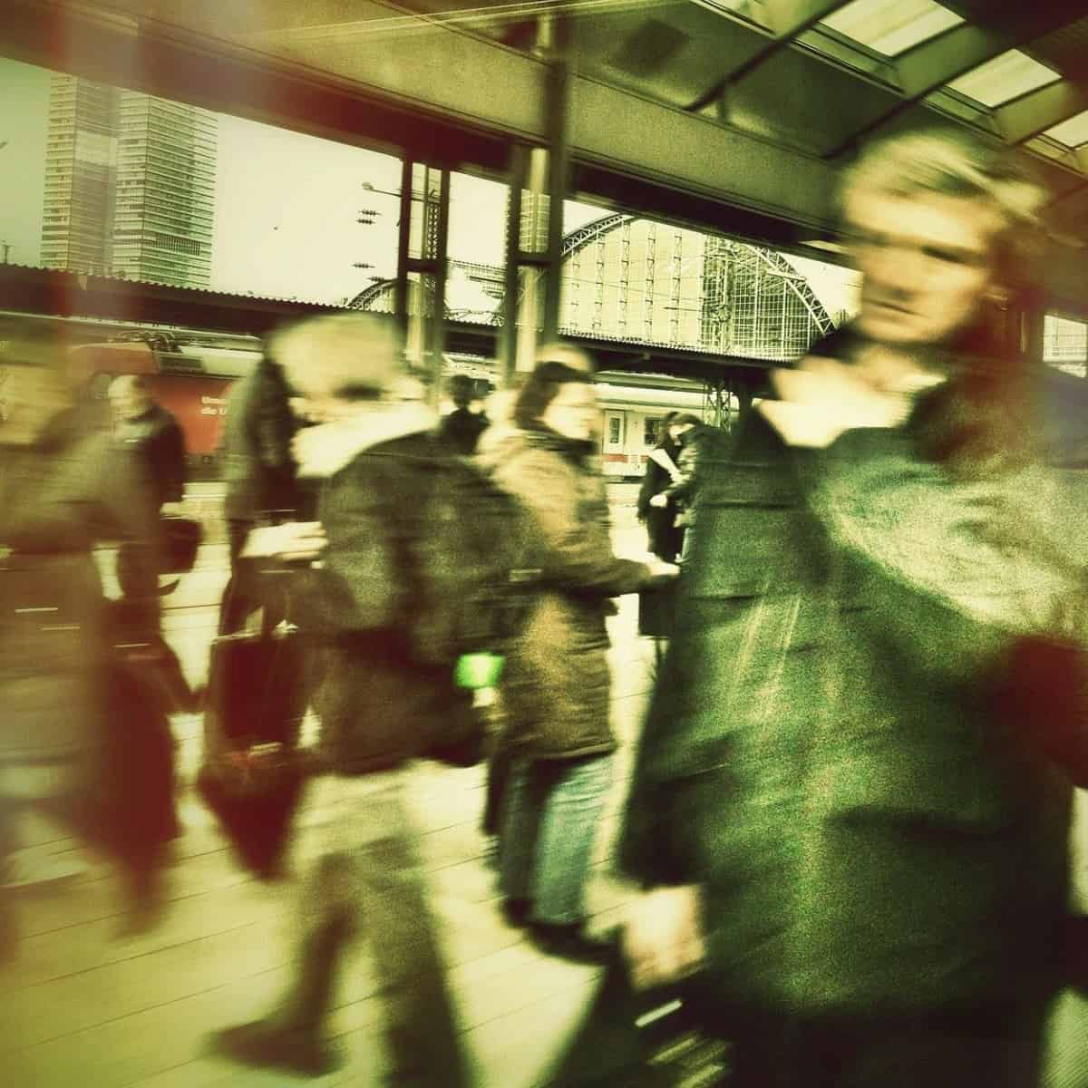 Blurred image of people moving around.