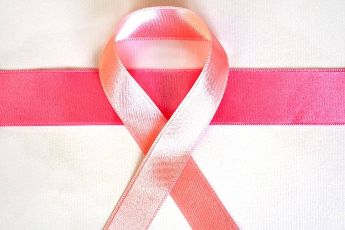 Pink ribbon set as a sign of cancer.
