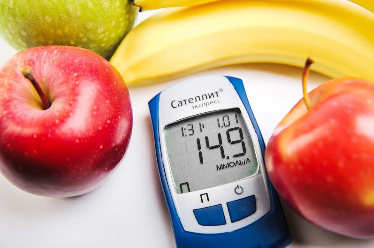 Fruits with glucometer.