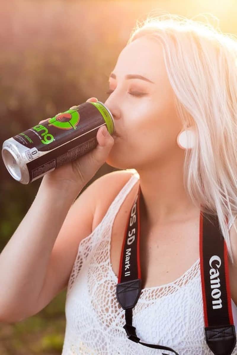 Woman drinking Energy Drink